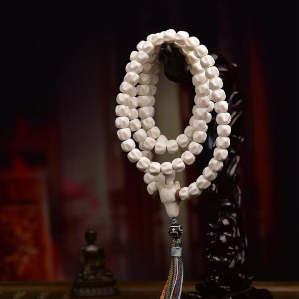 handcrafted tibetan mala beads with 108 passion seeds and deer horn pendant