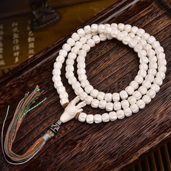 handcrafted tibetan mala beads with 108 passion seeds and deer horn pendant