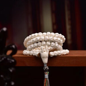 handcrafted tibetan mala beads with 108 passion seeds and deer horn pendant