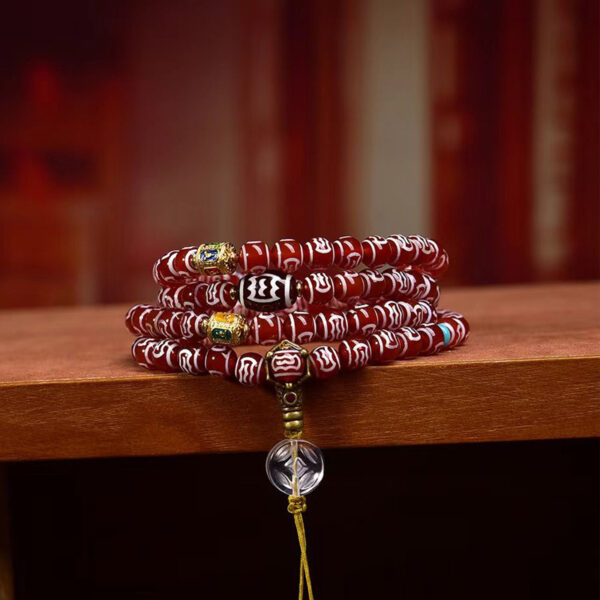 handcrafted tibetan agate dzi bead mala necklace with garuda motif and crystal accents
