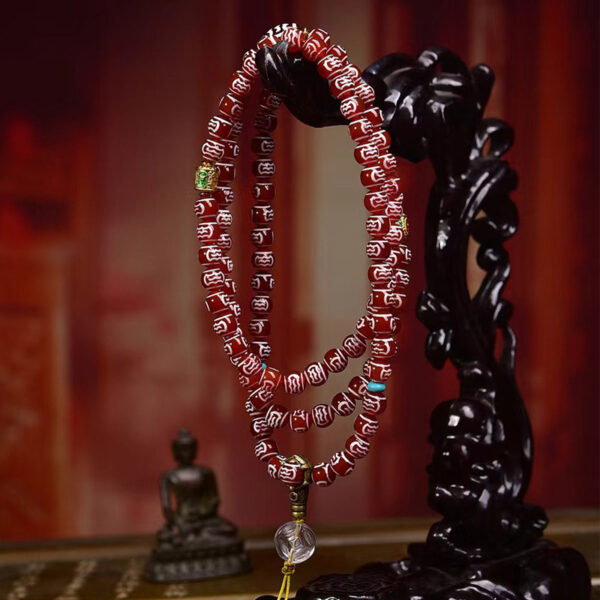 handcrafted tibetan agate dzi bead mala necklace with garuda motif and crystal accents
