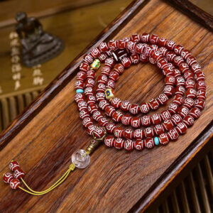 handcrafted tibetan agate dzi bead mala necklace with garuda motif and crystal accents