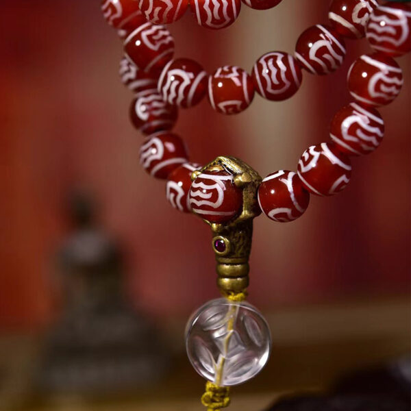 handcrafted tibetan agate dzi bead mala necklace with garuda motif and crystal accents